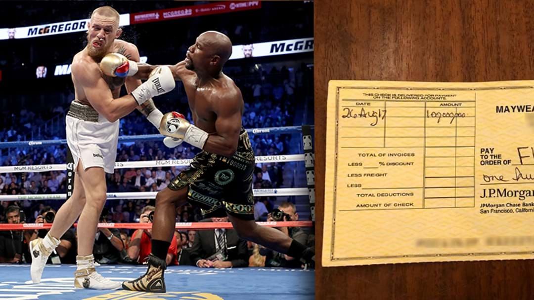Article heading image for Floyd Mayweather Shows Off The Massive Cheque He Received From The McGregor Fight