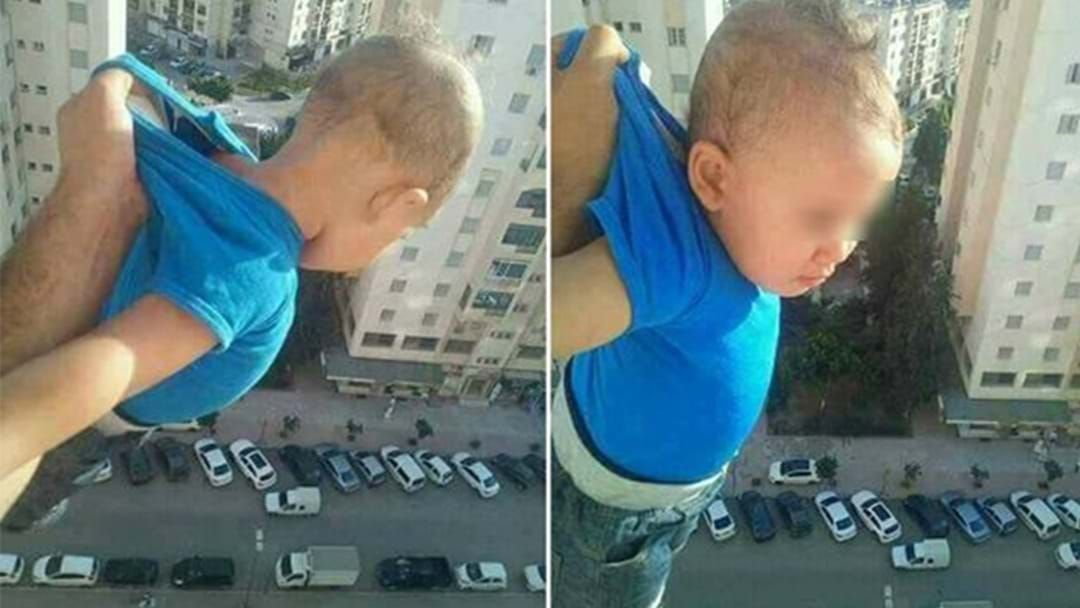 Article heading image for Dead-Set Fu**wit Gets Sent To Jail For Dangling His Kid Off Balcony
