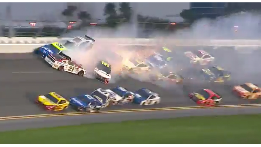 Article heading image for This 21 Car Pile-Up Almost Makes NASCAR Worth Watching 