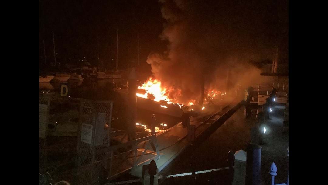Article heading image for Manhunt underway for two arsonists after 3 boats destroyed at Hope Island Marina overnight.