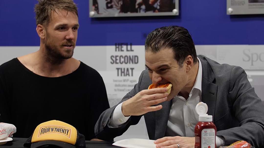 Article heading image for Watch Dane Swan Teach An American Journo The Proper Way To Eat A Meat Pie