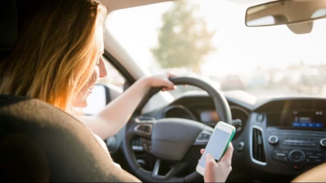 Article heading image for Aussie Drivers Spend Nearly 50 Per Cent Of Their Time Behind The Wheel Distracted