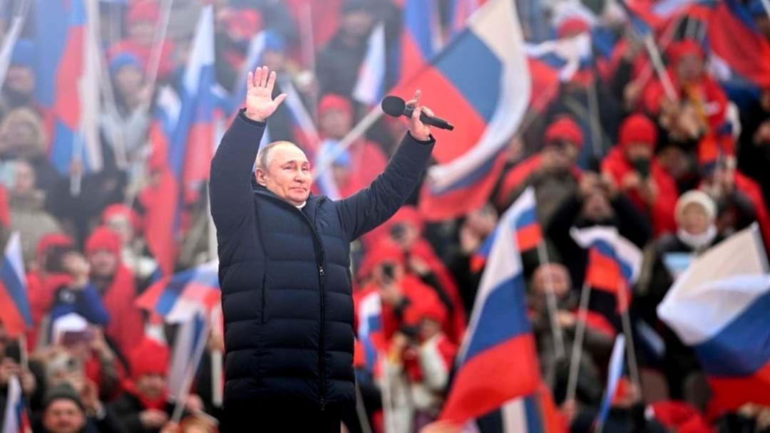 Article heading image for Vladimir Putin Makes Rare Appearance At Flag-Raising Rally In Moscow