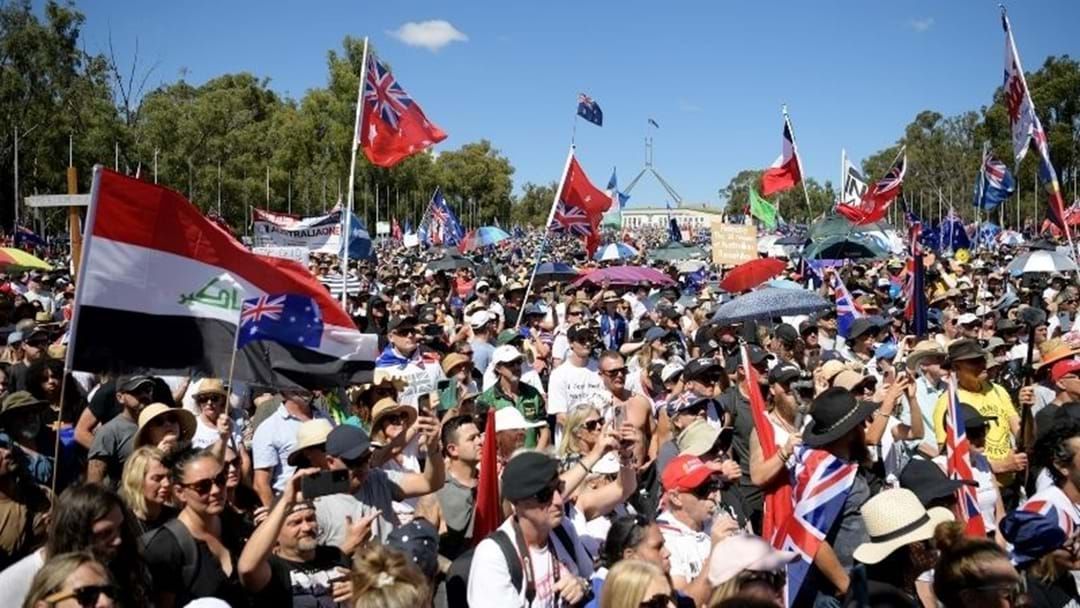 Article heading image for Thousands Of Protestors Swarm Lawn of Parliament House 