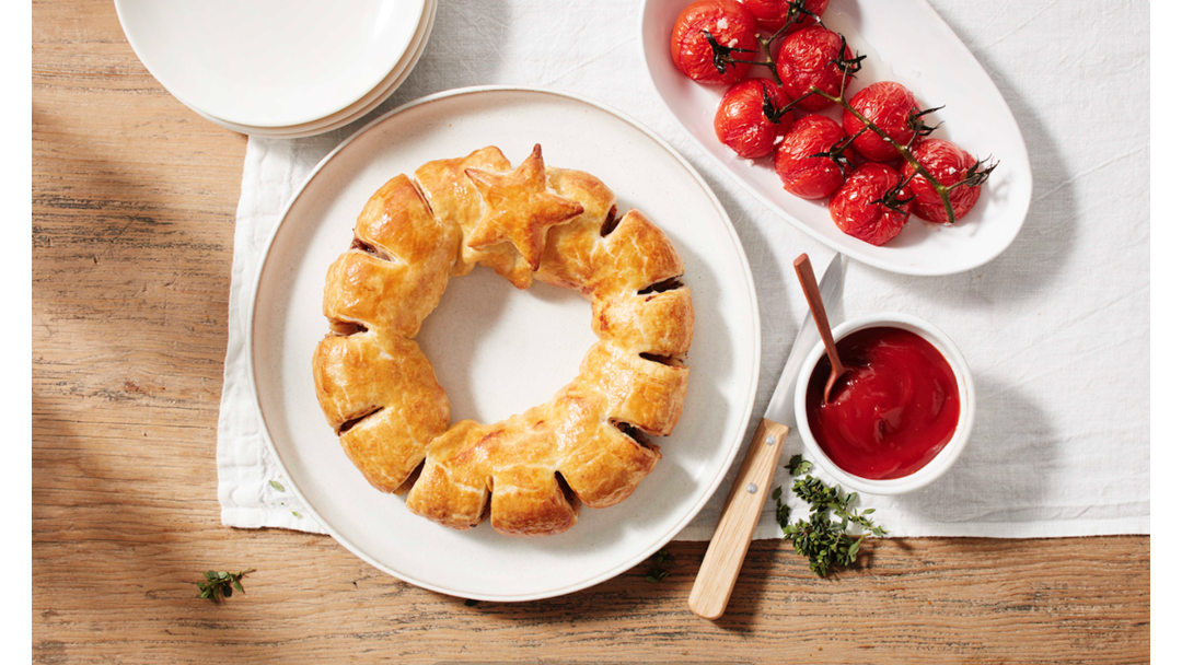 Article heading image for Coles Are Doing A Sausage Roll Wreath And Christmas Is Now Perfect
