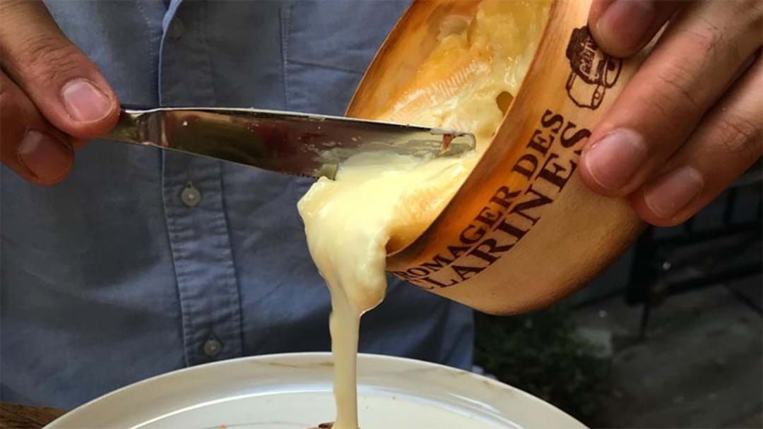 Article heading image for This Sydney Bar Serves Melted Cheese Wheels Every Thursday Night Because They're Geniuses! 