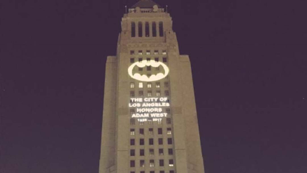 Article heading image for Thousands Gather As Bat-Signal Tribute To Adam West Lights Up L.A.