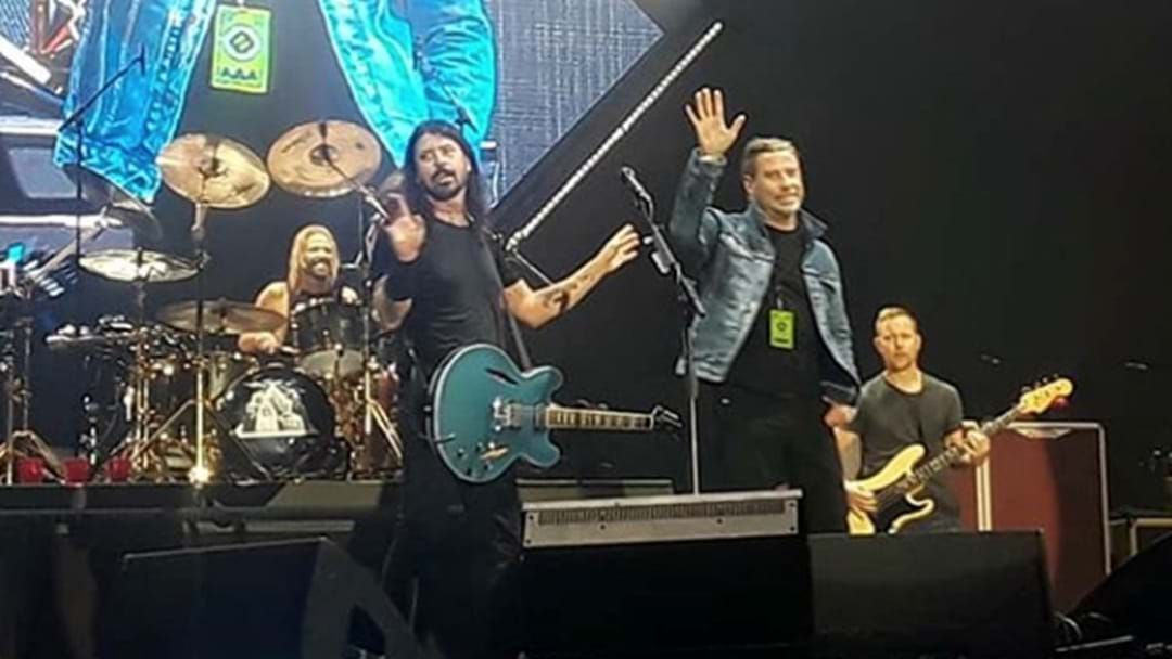 Article heading image for WATCH: John Travolta Join Foo Fighters On Stage As They Perform A Grease Classic