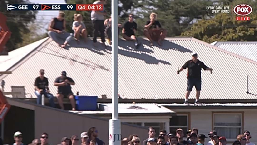 Article heading image for People Were Watching The JLT Game In Colac From A Roof Opposite The Ground