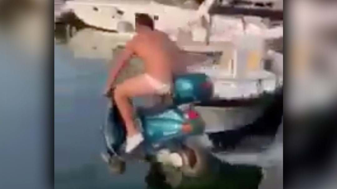 Article heading image for Notoriously Loose Soccer Player Questioned By Cops For Paying A Bloke To Ride A Moped Into The Sea