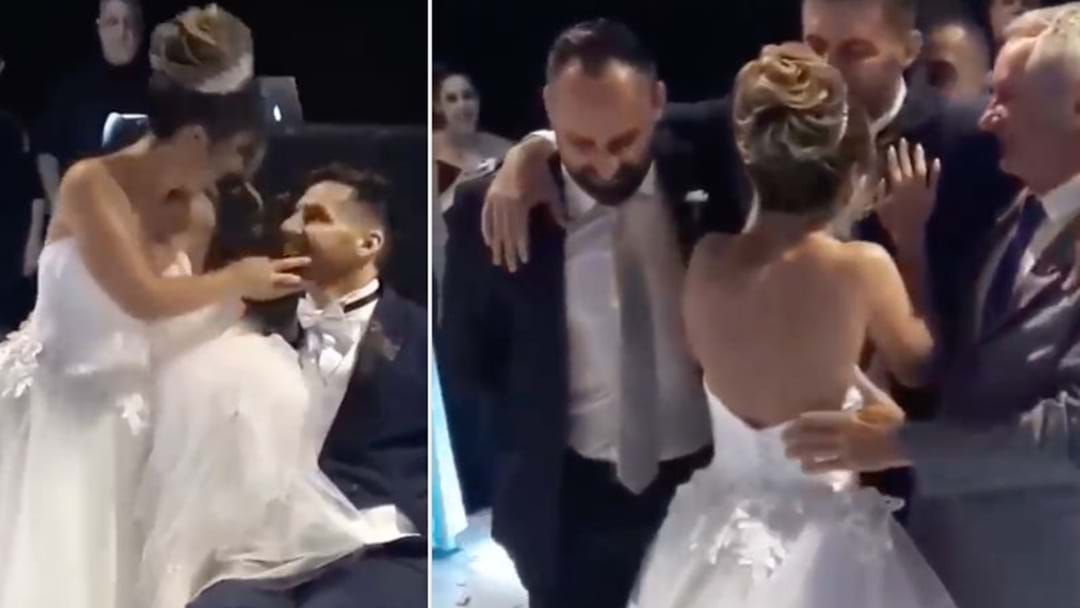 Article heading image for Hearts Are Melting As Wheelchair Bound Groom Gets Up For His Bridal Waltz