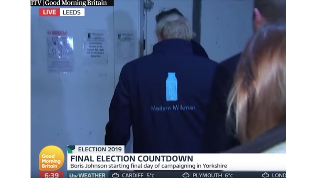 Article heading image for The British Prime Minister Just Hid In A Fridge Dressed Up As A Milkman