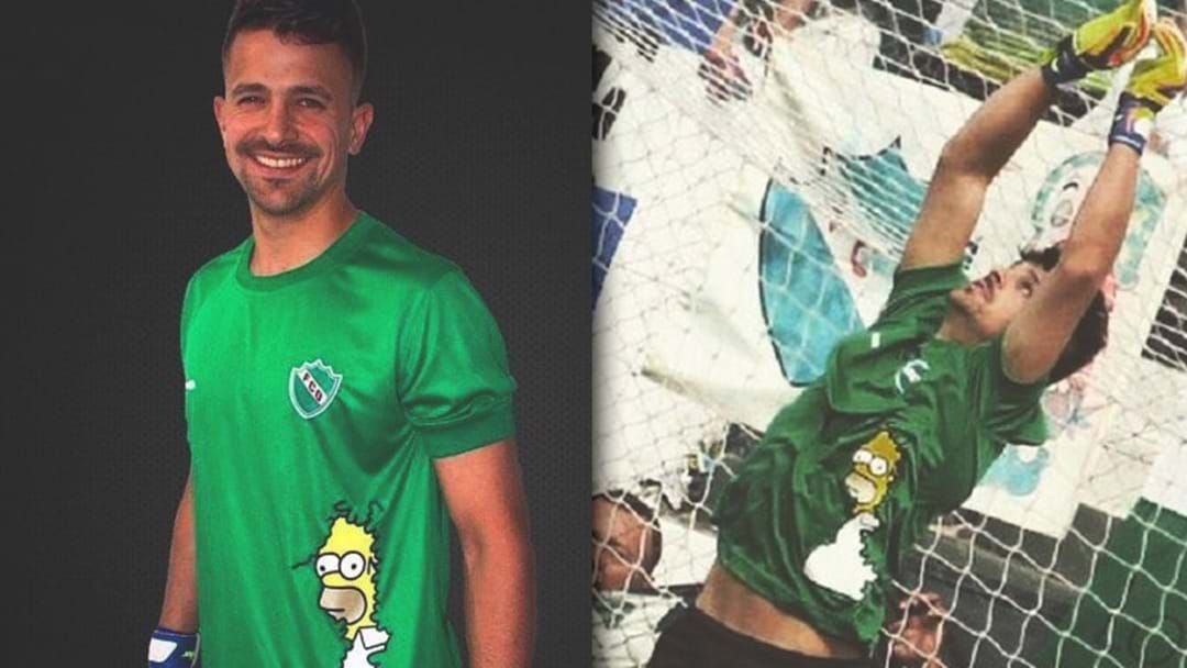 Article heading image for Argentine Soccer Team Releases Goalkeeping Kit Featuring The Homer Simpson Bush Meme