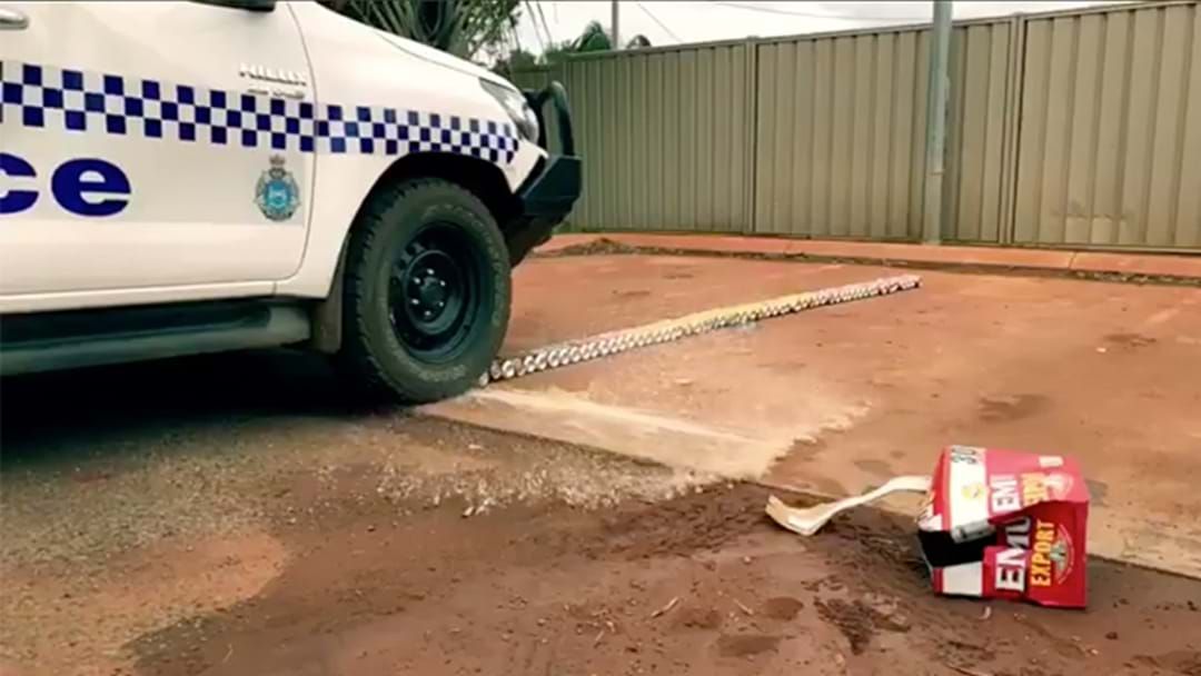 Article heading image for WA Police Destroy A Slab Of Emu Export By Running Over Each Can Individually