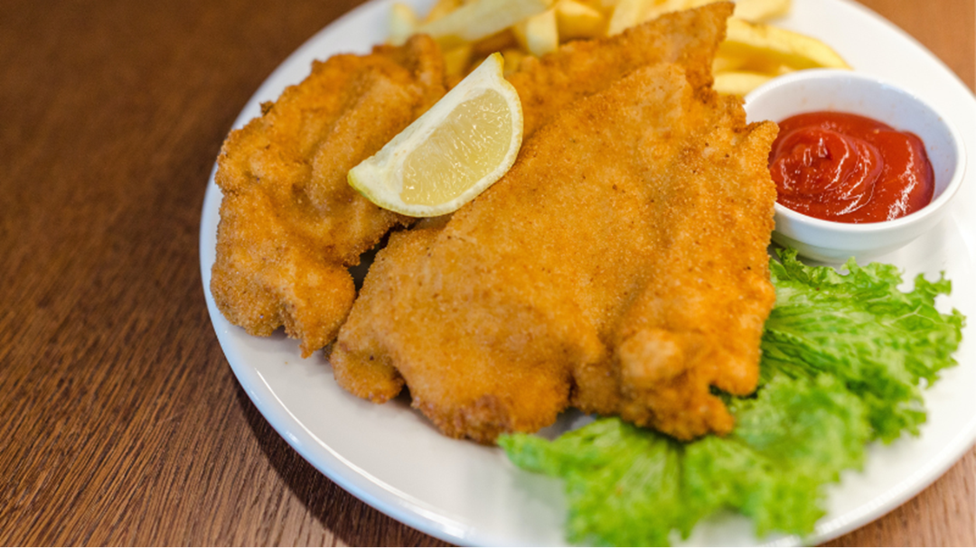 Article heading image for Local Chef Reveals Why Your Schnitzel Is Always ON TOP Of Your Chips!