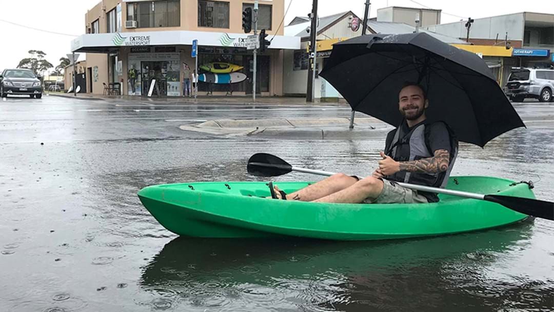 Article heading image for Bloke Goes Kayaking Down The Street After Floods Hit Melbourne