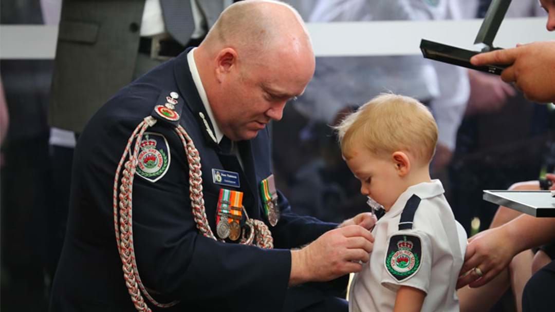 Article heading image for Heartbreaking Photos Show Firefighter Geoffrey Keaton’s Son Receiving A Medal At His Funeral 